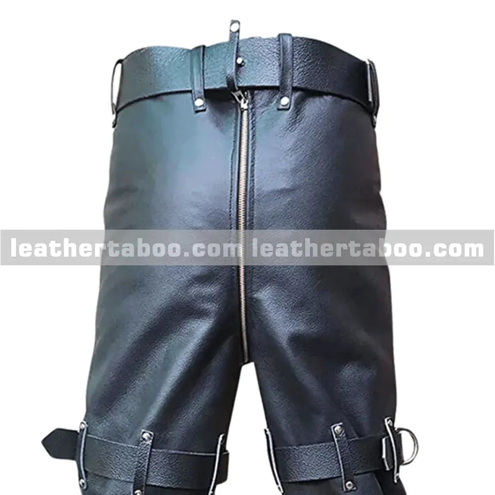Handmade black leather trousers featuring metal buckle strap details and outer leg zipper on fitted cut punk style pants