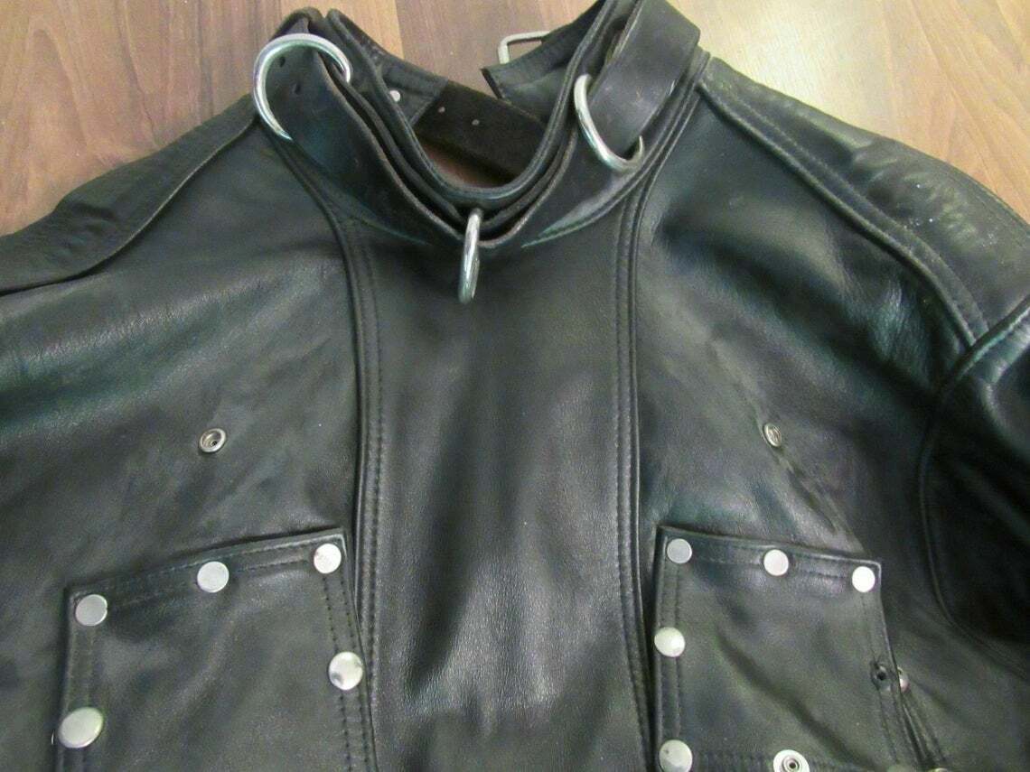 Black leather straitjacket inspired costume fashion design