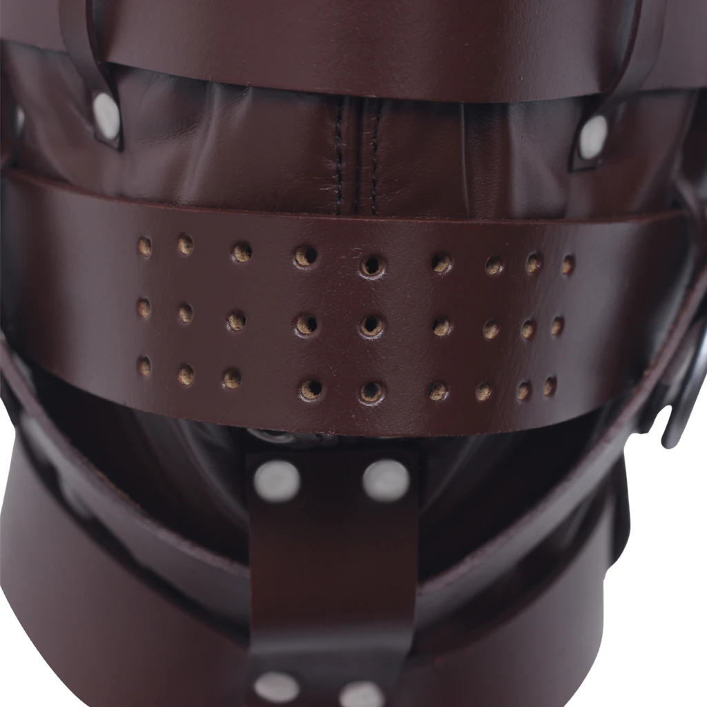 Close-up of the perforated lower face band on a brown leather hood, showing rows of circular holes, retaining loops and chin strap hardware.
