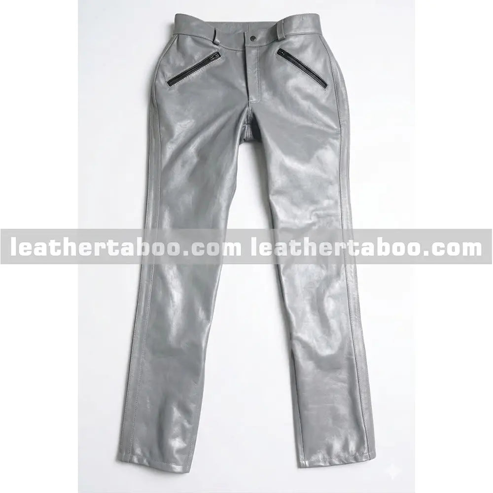 Close-up of grey leather biker shirt highlighting button closure, chest pockets, and fine stitching details
