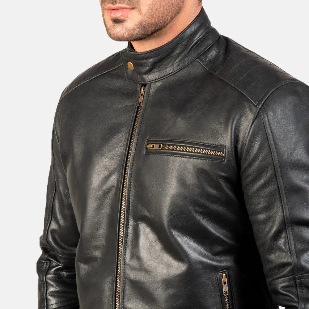 Close up black leather biker jacket zipper and stitching detail