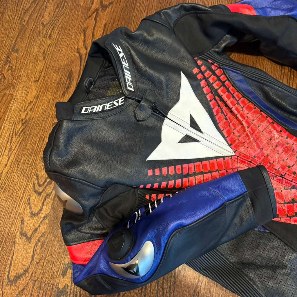 Genuine cowhide racing suit with CE armor compatibility and custom sizing options for riders.