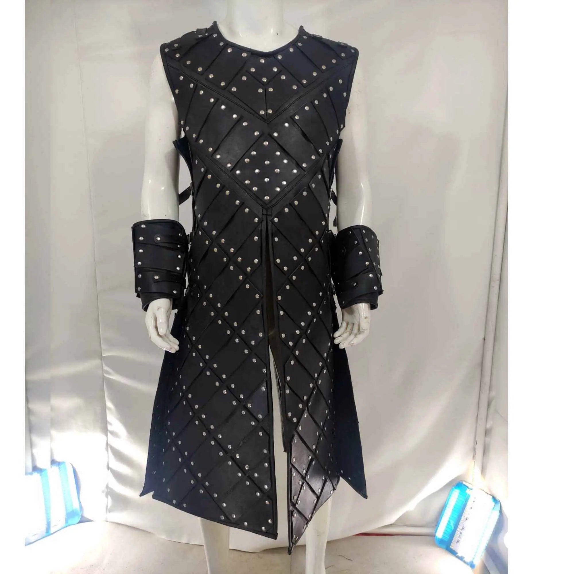 Medieval fantasy leather armor with shoulder pauldrons