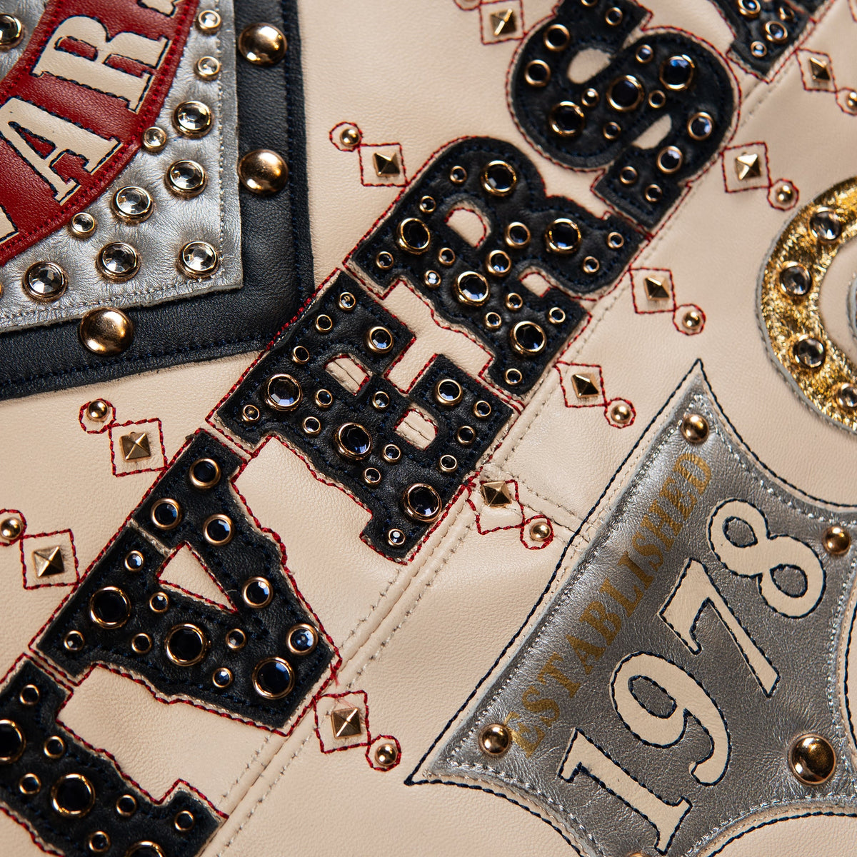 Cream leather anniversary tribute jacket, back artwork with gold studs, Limited Edition script and scroll detai