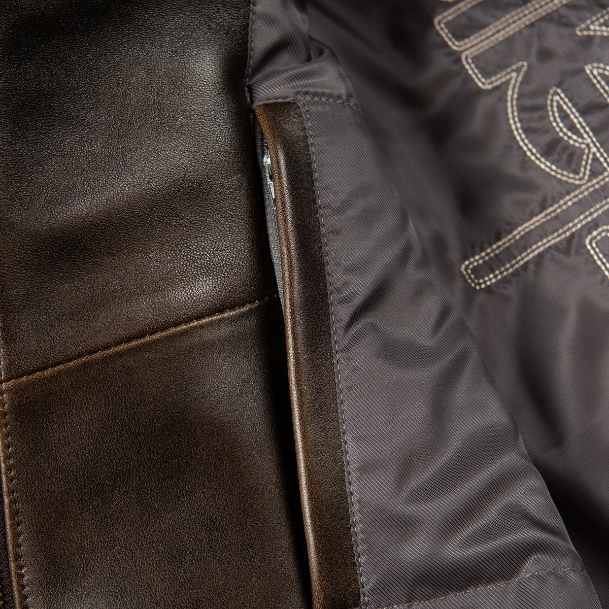 Handmade Pelle Pelle-style 48th Anniversary jacket in distressed brown cowhide with studded 48 crest, cream lettering and 1978 detailing. XS–8XL, made in the USA.