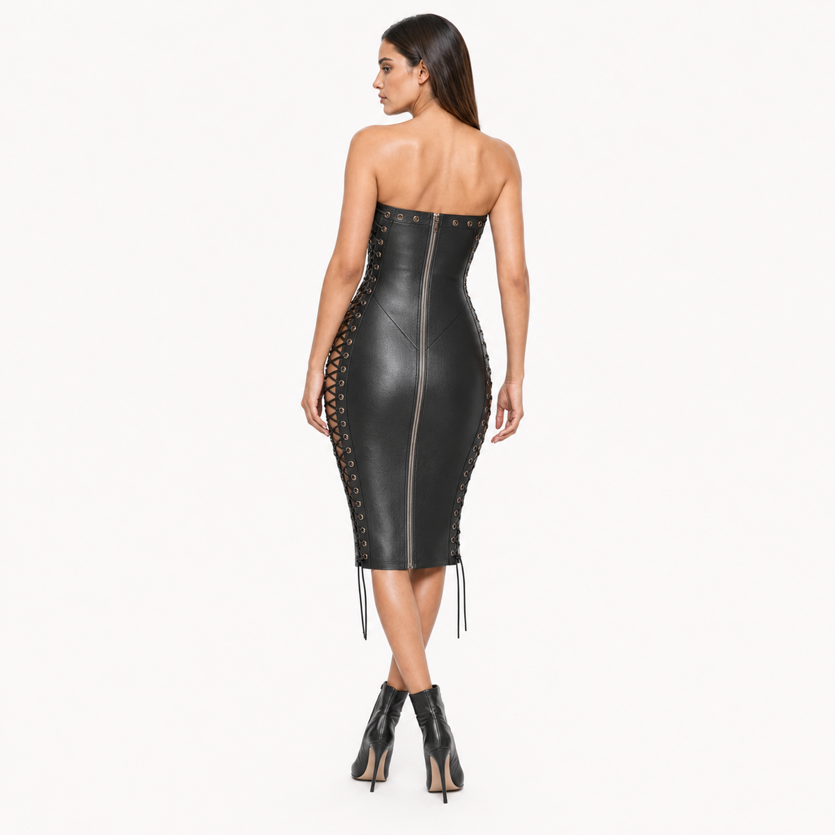Rear view of women’s black leather strapless midi dress showing center back zipper, metal eyelets, side lacing and fitted panel seams.