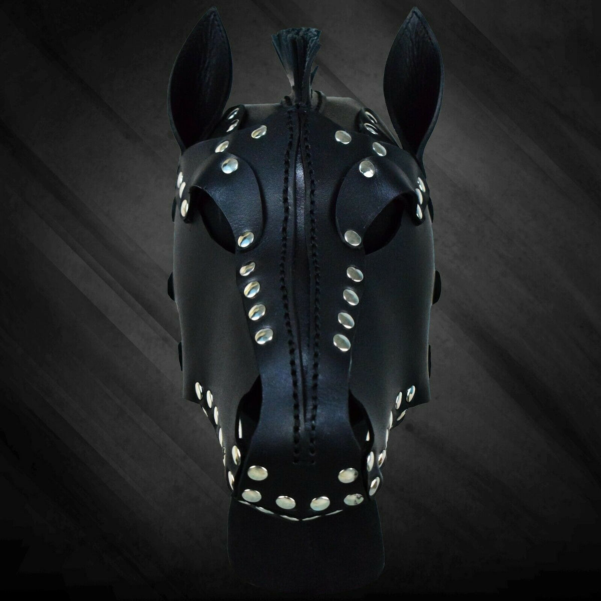Front view of black leather horse mask with pointed ears, silver-tone studs, shaped eye openings, long muzzle and short fringe mane.