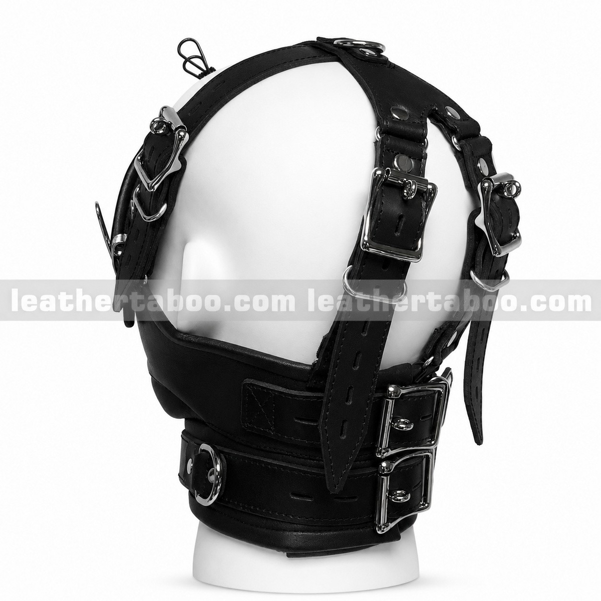 Rear view of black leather face harness mask showing crown straps, silver-tone buckles, adjustment slots and collar closure on a white mannequin.