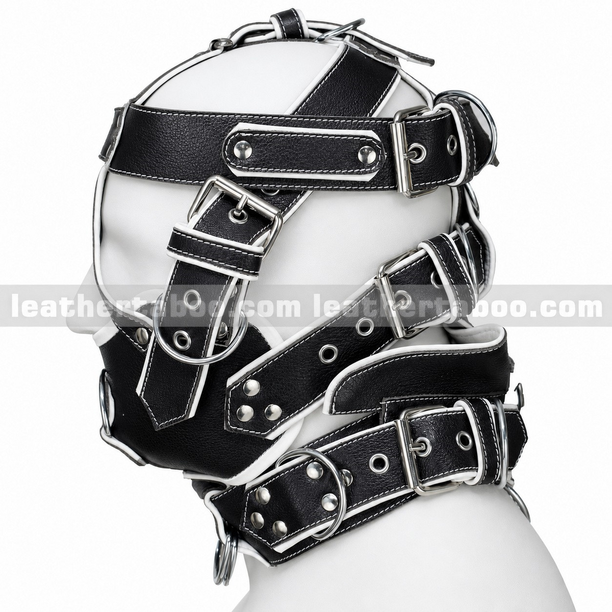 Side view of black leather head harness with white piping, adjustable buckle straps, covered mouth panel and D-ring collar on a white mannequin.