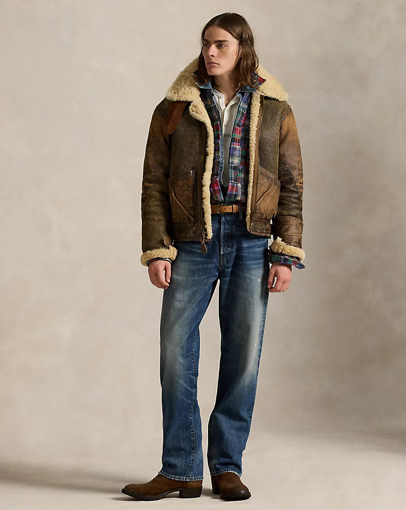 Front view of men's distressed brown genuine leather aviator jacket with cream pile collar, zip fastening and large angled pockets.
