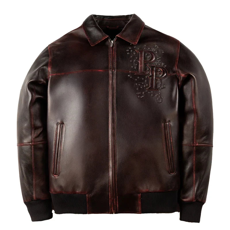 Front of black and red Pelle Pelle Shoulder Crest jacket with a studded PP chest monogram, front zipper and black rib-knit cuffs.