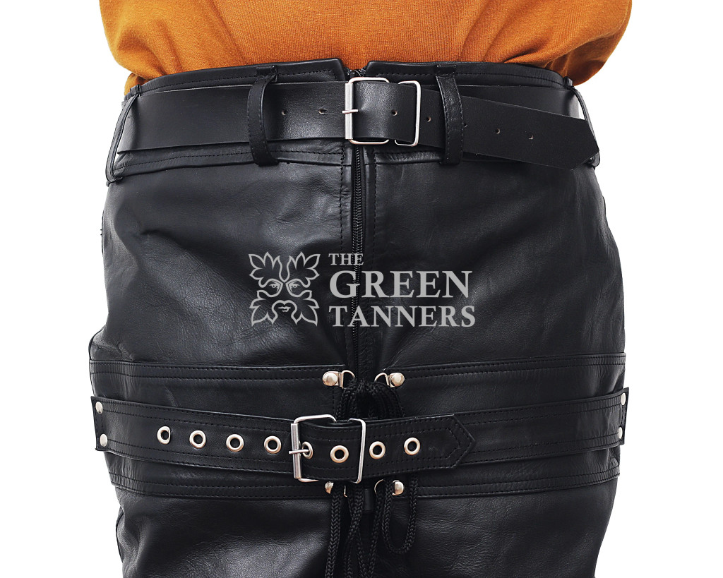 Close-up of black genuine leather leg binder waist showing belt loops, silver-tone buckle, front zipper and eyelet strap details.