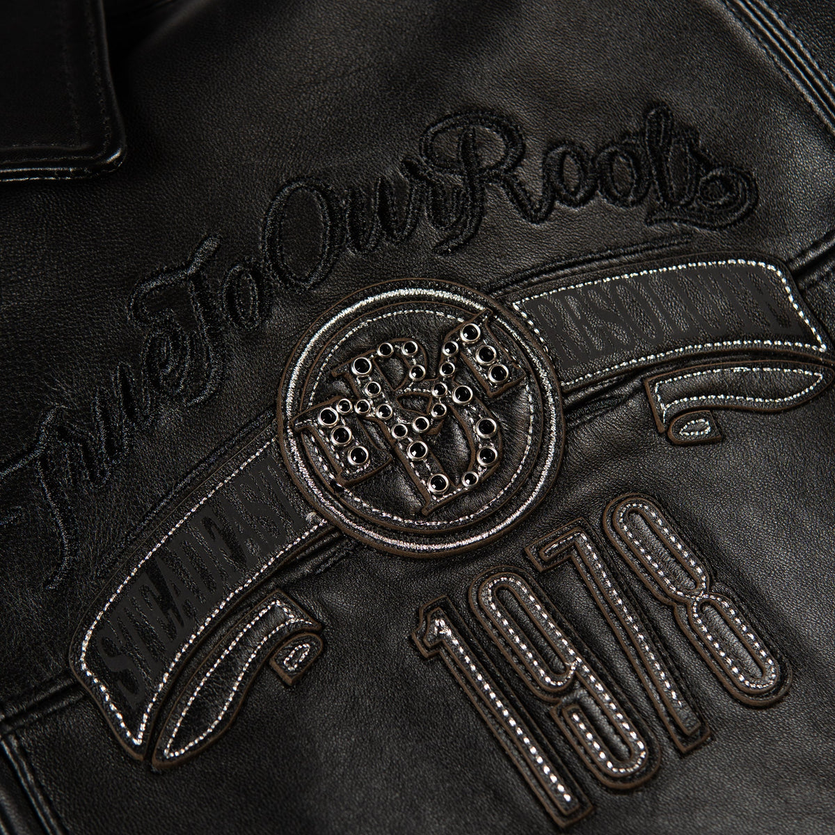 genuine cowhide leather, black-on-black colourway