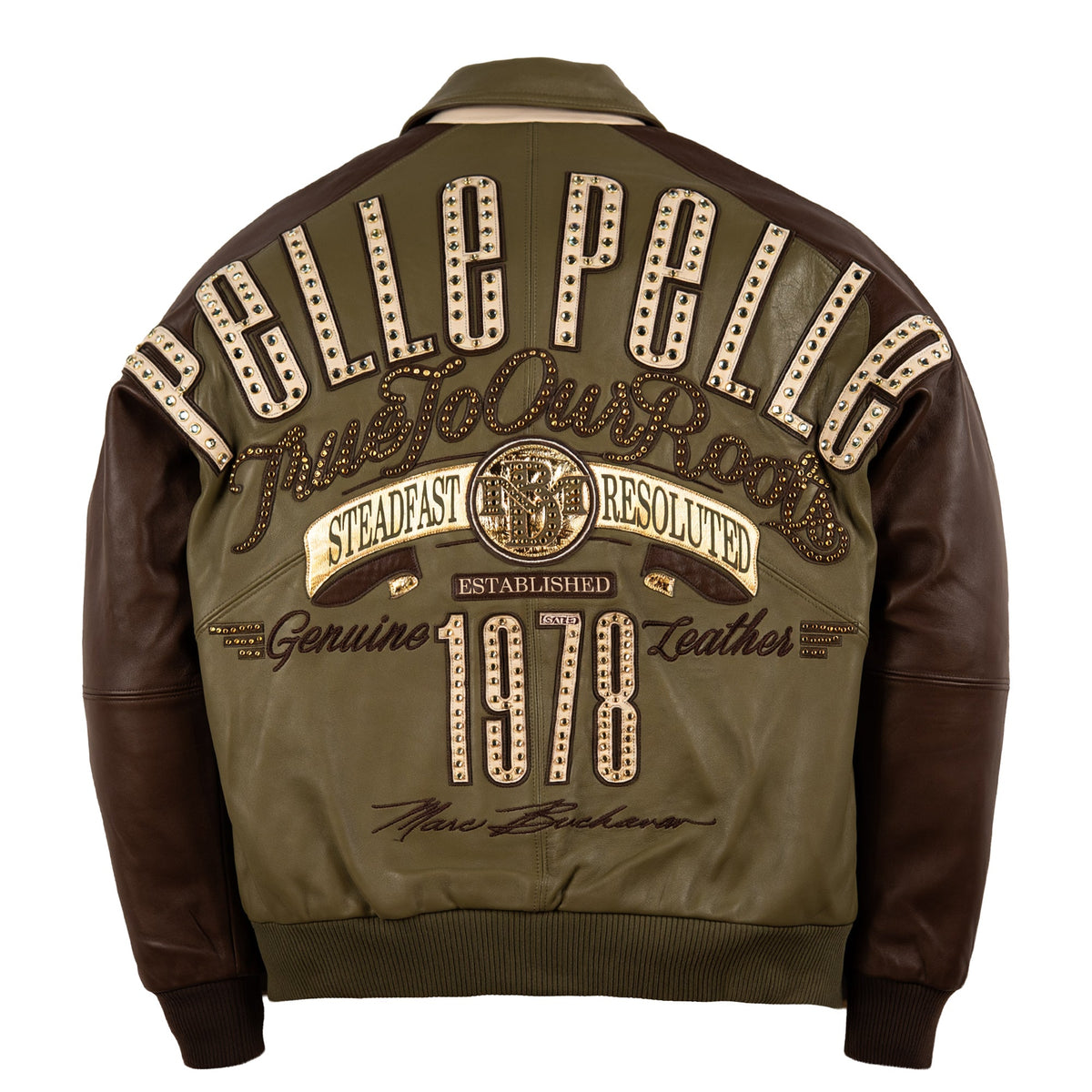 Back view of an olive green and brown leather bomber jacket featuring large 'PEBBLE PEBBLE' lettering and 'True To Our Roots' text with decorative studs and rivets on a white background.
