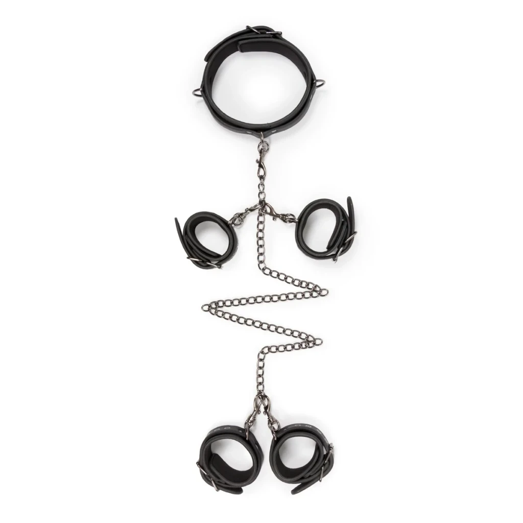 Flat layout of a black leather cuff set showing one collar, four cuffs, metal rings and chain sections with connector clips on white.