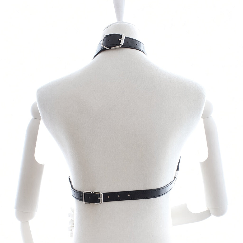 Rear view of black leather collar chest harness on a mannequin, showing separate adjustable buckle closures at the neck and torso straps.