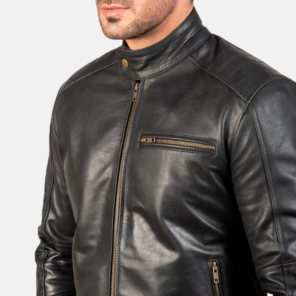 Close up black leather biker jacket zipper and stitching detail