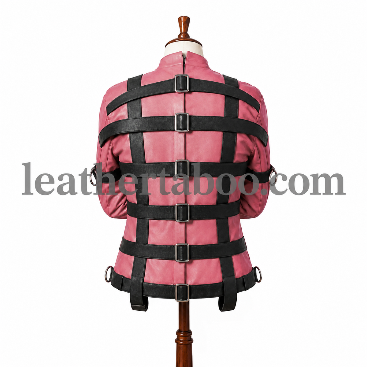 Back view of a rose pink genuine leather straitjacket showing black adjustable buckles, vertical straps, silver D-rings and a high collar.