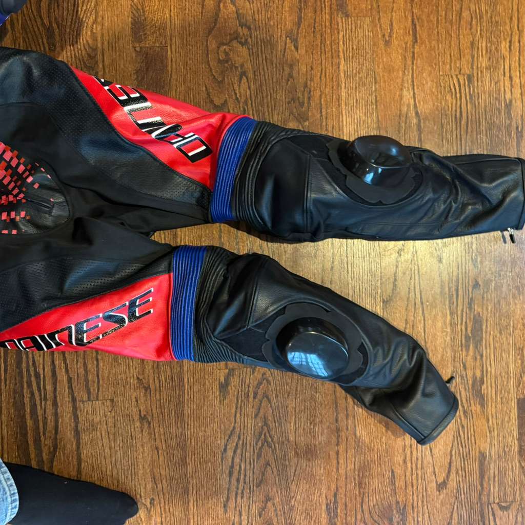 One-piece motorcycle track suit offering comfort, durability, and race-ready performance features