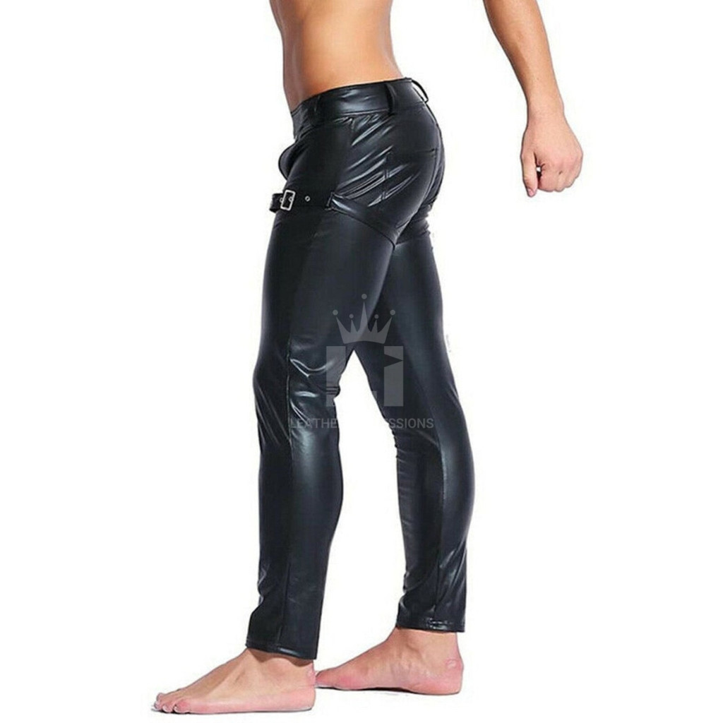 Side view of men's black leather chaps with a silver-tone hip buckle, eyelet strap, wide waistband and glossy full-length leg panels.