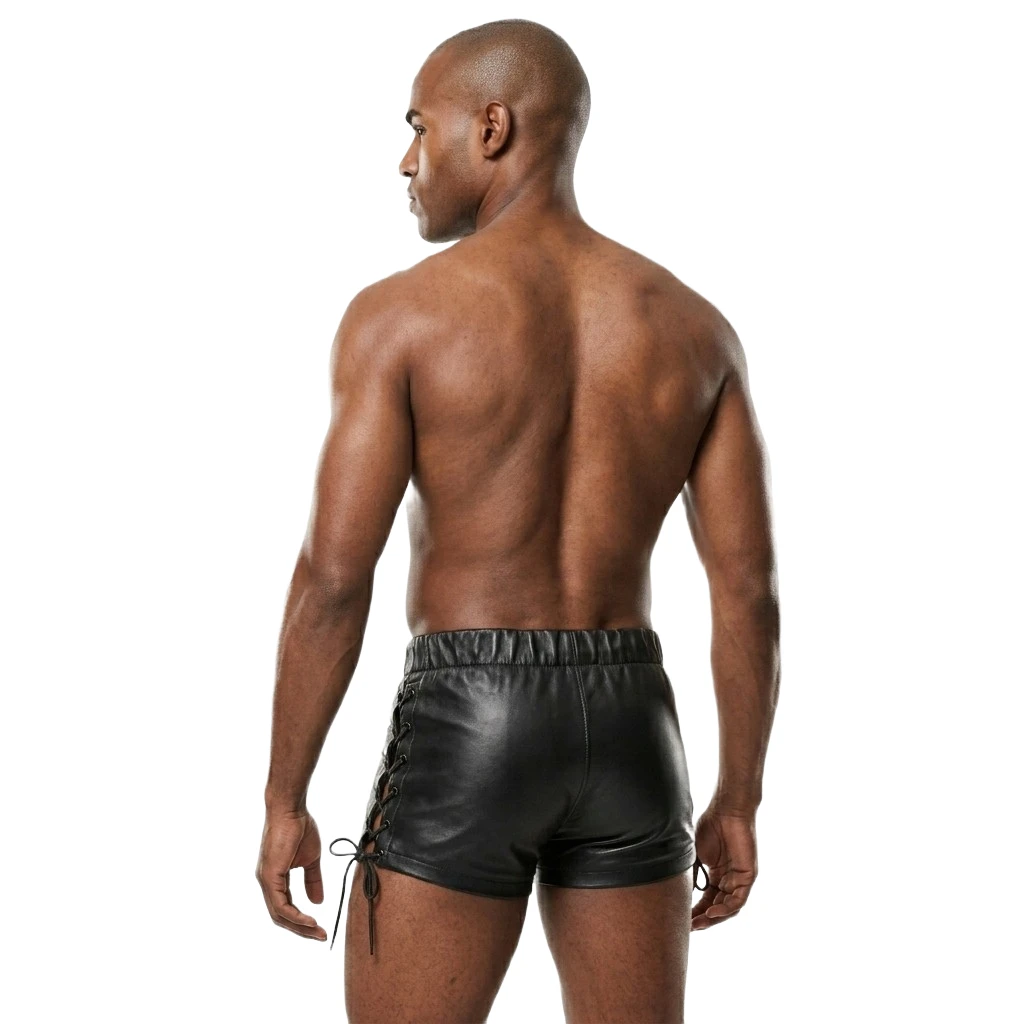 Rear view of men's black leather shorts showing the covered back, center seam, gathered waistband and side lacing tied near the hems.