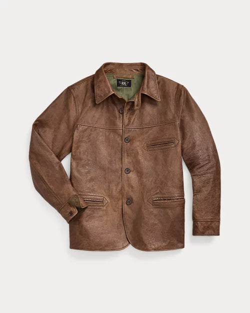 Front view of men's distressed brown leather jacket with a pointed shirt collar, button closure, chest welt pocket and two lower pockets.