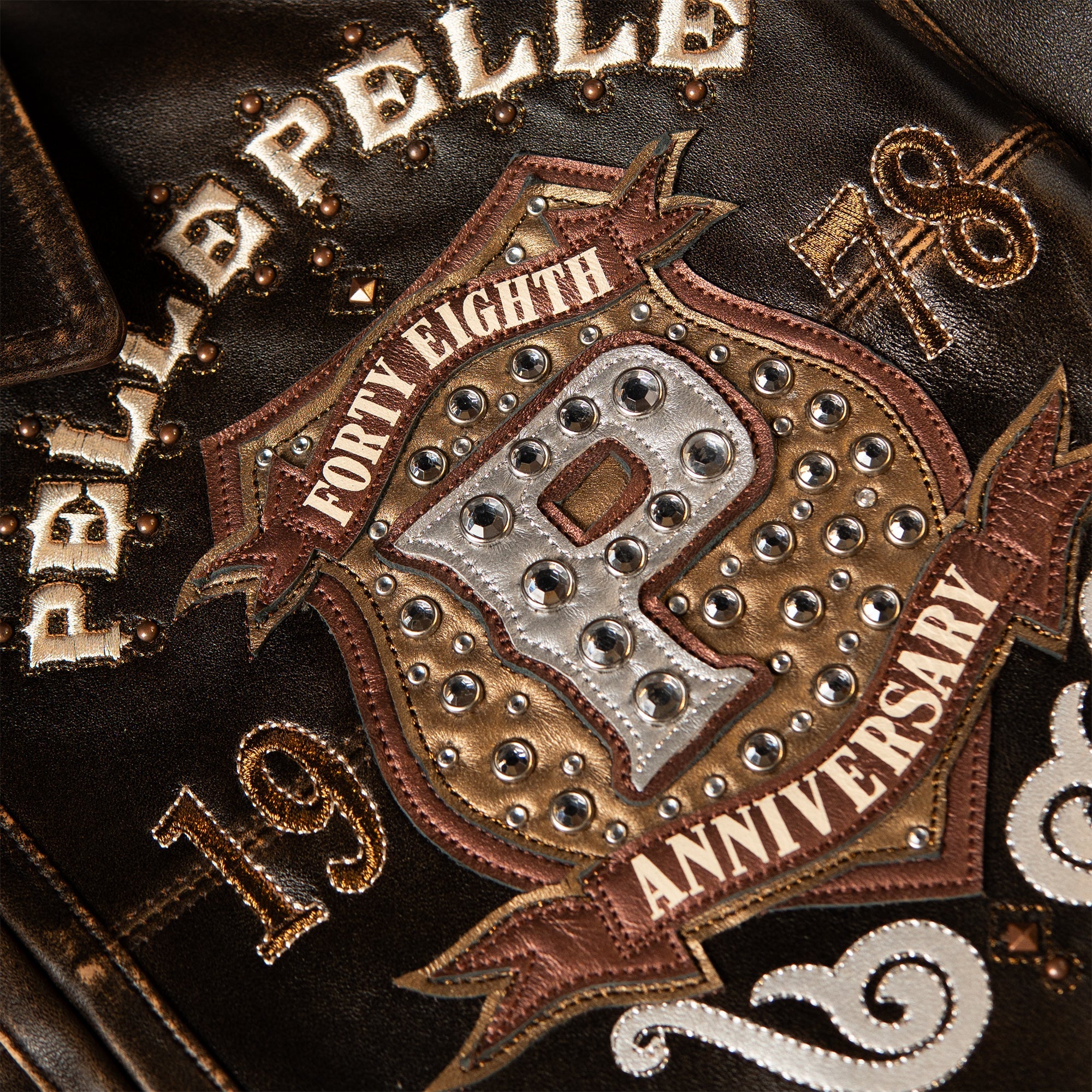 genuine cowhide leather, distressed antique-brown finish with lighter rub-through at the seams and edges