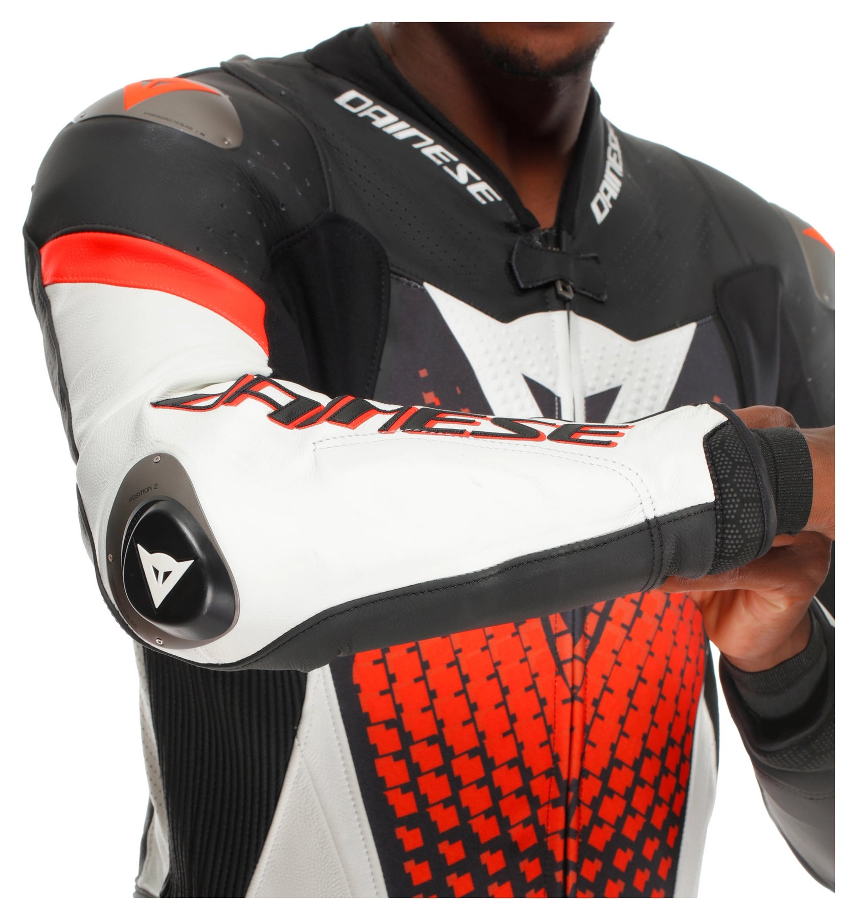 Premium Dainese biker leather suit with reinforced knee sliders and professional motorcycle protection