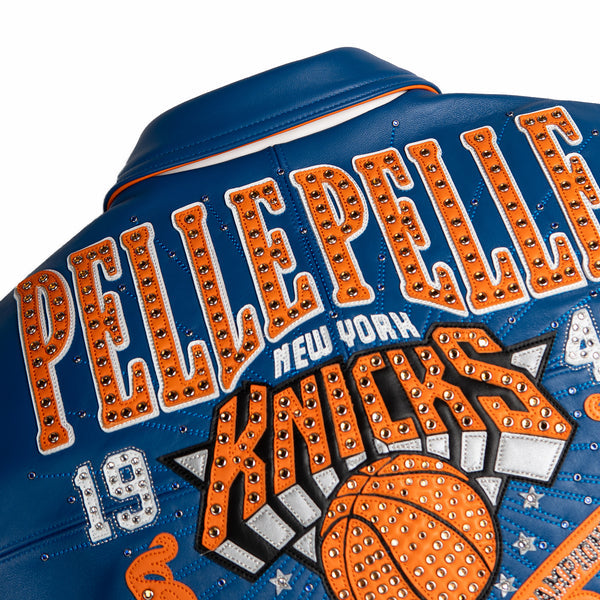 Women's blue and orange leather varsity jacket, upper back graphics detail, showing New York basketball graphics and contrasting decorative details.