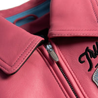 Women's pink and black leather varsity jacket, collar and zipper detail, featuring contrast panels and decorative lettering in the product photo.