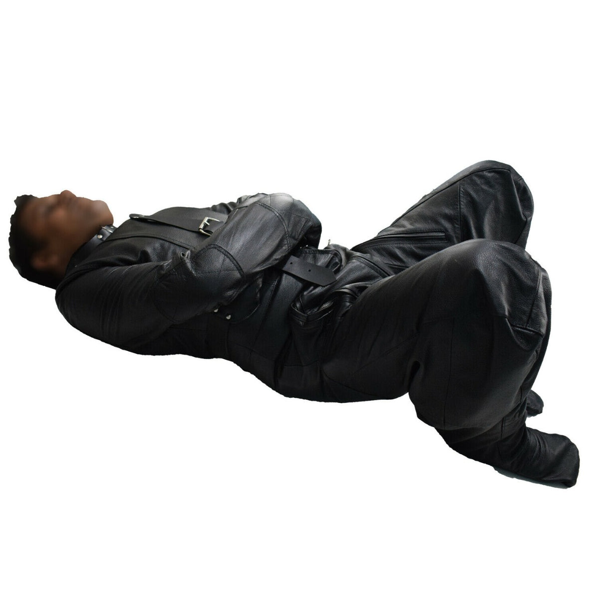Side view of black genuine leather suit with enclosed sleeves, crossed arms, bent legs, covered feet and silver-tone buckle details.