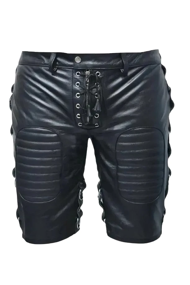 Front view of men's black genuine leather shorts with ribbed thigh panels, lace-up zipper front, snap waistband and metal side rings.