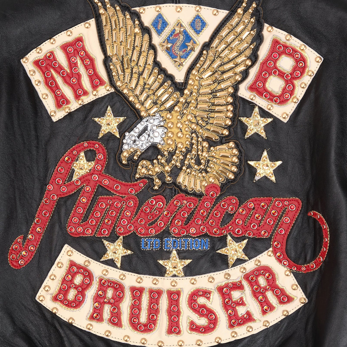 Women's black leather eagle patch bomber jacket, close-up of the gold-tone eagle back applique, star accents and red lettering.