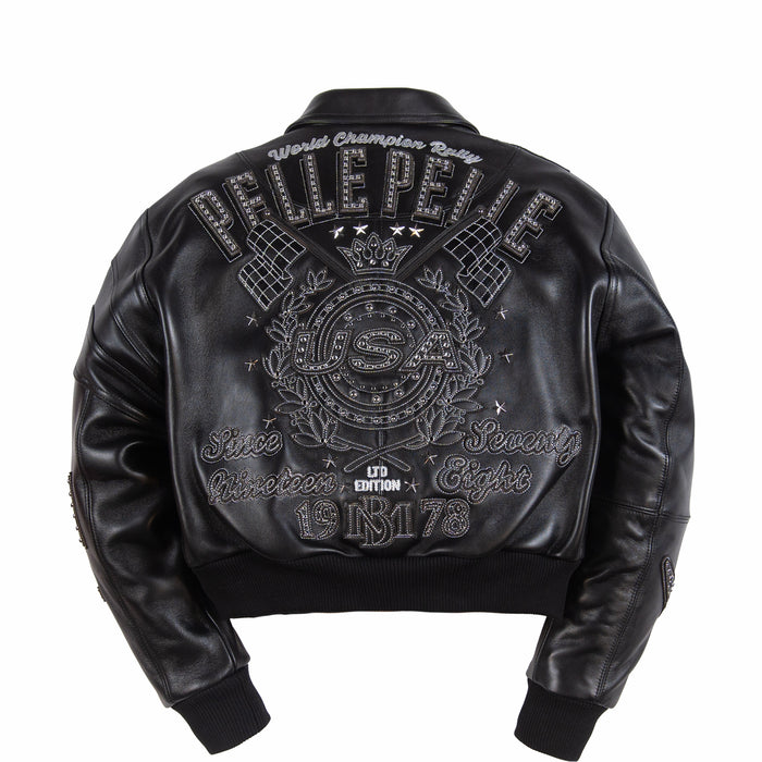 Rear of women's black leather racing jacket with decorative lettering, crossed flag motifs, USA crest and silver-tone embellishments.